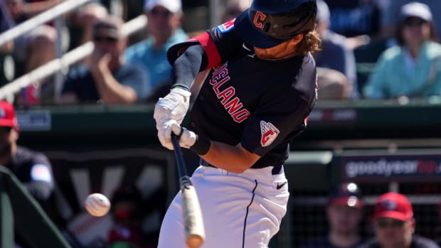 Mar 2, 2024; Goodyear, Arizona, USA; Cleveland Guardians third baseman Daniel Schneemann (88) bats against the Kansas City Royals during the first inning at Goodyear Ballpark.